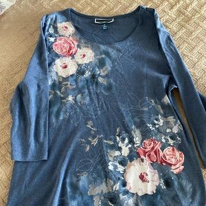 Blue blouse with flower designs